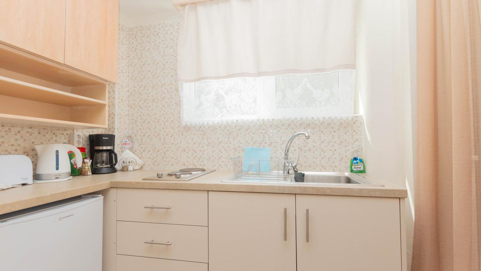Akrotopi Apartments & Studios Толон Стая снимка