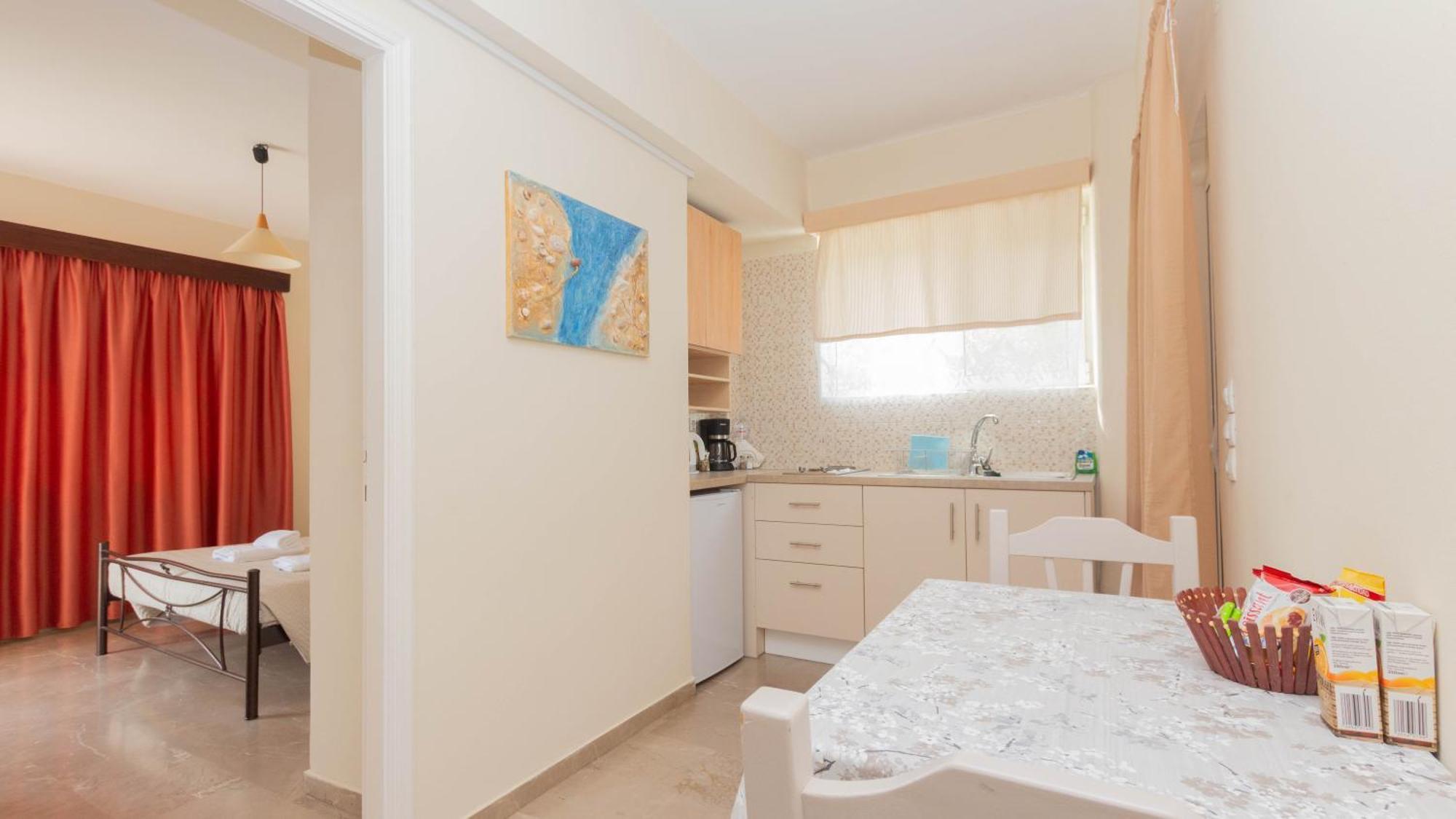 Akrotopi Apartments & Studios Толон Стая снимка