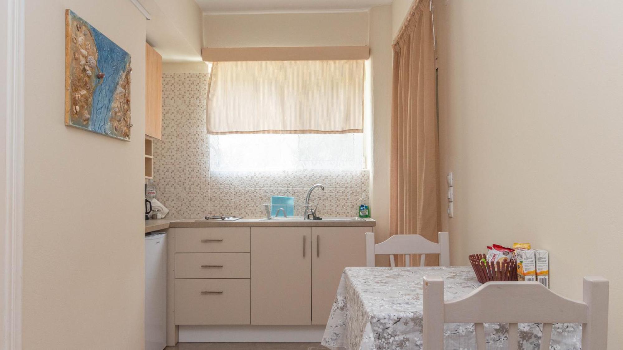 Akrotopi Apartments & Studios Толон Стая снимка
